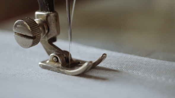 Sewing Machine And Item Of Grey Clothing