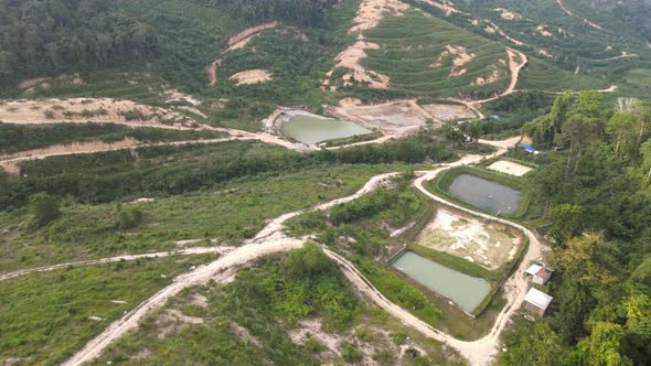 Aerial view of farms, fish pond and highway in Jelebu