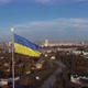 the national flag of Ukraine and the statue of liberty over Kyiv, panorama right - VideoHive Item for Sale