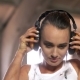 Young Woman Puts On Construction Headphones - VideoHive Item for Sale