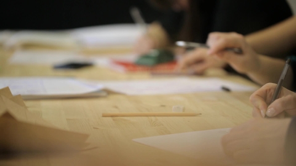 Female Hand With Nice Manicure Paints Sketch With Help Of Black Gel Pen