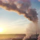 smoke from factory chimneys on the background of sunrisee - VideoHive Item for Sale
