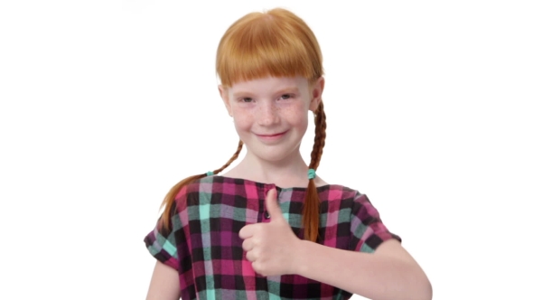 Redhead Girl With Two Pigtails Is Showing Thumb Up Gesture