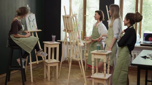 Female Students at Art Workout Leading By Mentor in Studio