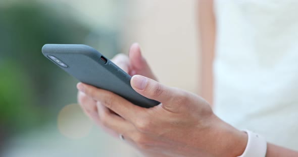 Close up of woman using mobile phone