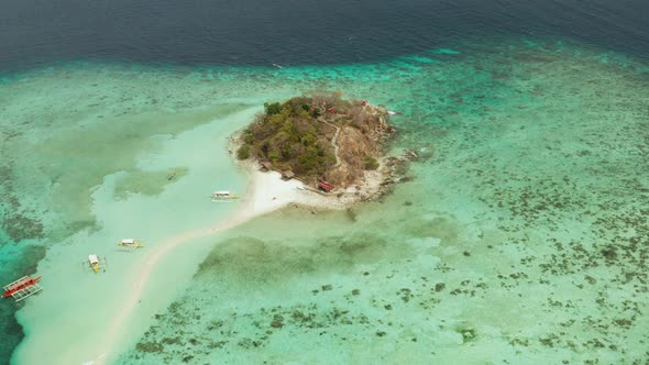 Small Torpic Island with a White Sandy Beach Top View