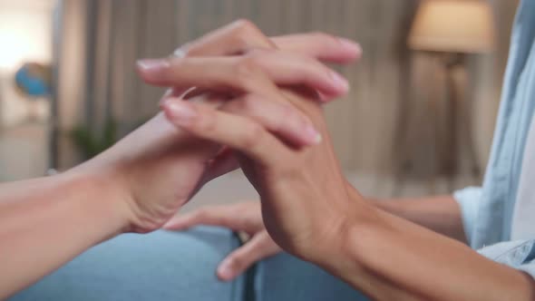 Authentic Close Up Footage Of A Young Adult Gay Couple Holding Hands And Spend Time At Home