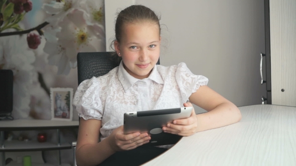 Little Girl Holding a Digital Tablet Computer