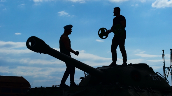 The Officer Makes The Soldier To Perform Heavy Exercise.