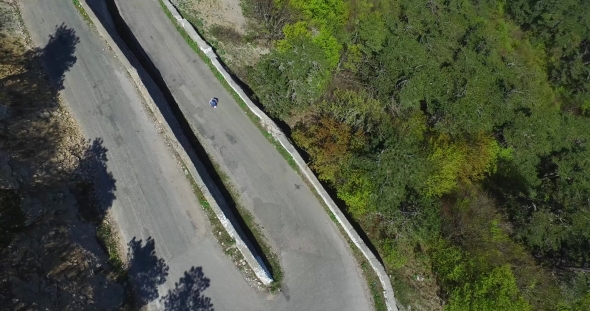 Disabled Man On A Mountain Serpentine Road