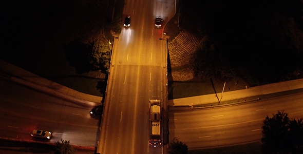 Aerial View of Interstate Highway Overpass at Night