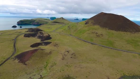 Flying over Eldfell volcano on Heimaey island (Westman Islands) in Iceland