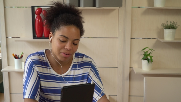 African Mixed Race Woman Has Video Call On Touch Screen Tablet