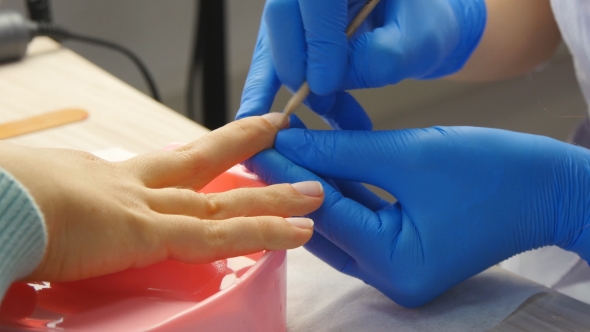 Girl Makes a Manicure In The Salon