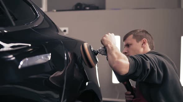 Rubbing Black Car to Achieve Perfect Glance with a Polishing Mashine