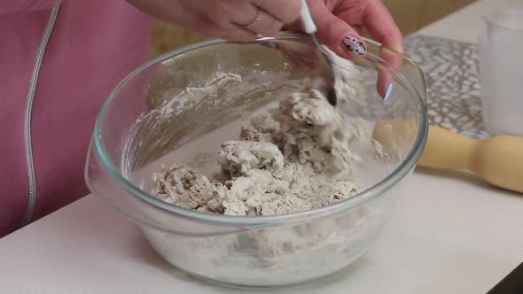 A Woman Prepares Unleavened Bread For The Lord Supper.