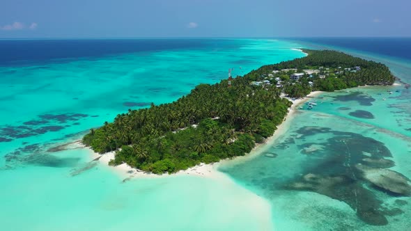 Aerial drone view landscape of relaxing resort beach holiday by shallow lagoon with white sand backg