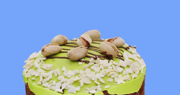 Easter Pastries Are Decorated With Pistachios And Green Icing