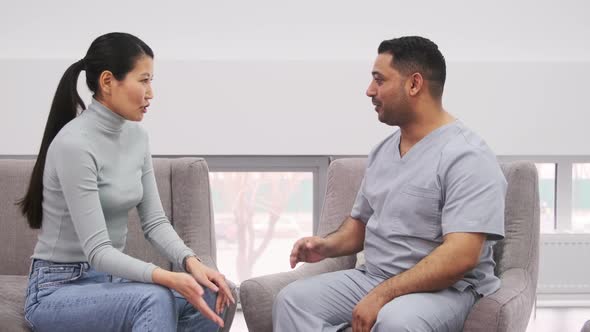 Doctor Video Footage - A Woman Consulting With A Health Worker