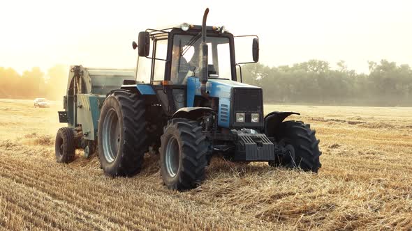 Working Blue Tractor in the Field.