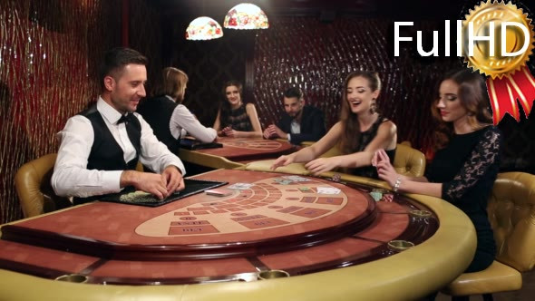 Lucky Woman Winning Money in the Casino