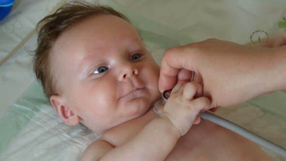 Sweet Baby Examined With Stethoscope