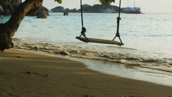 A Rope Swings On The Beach