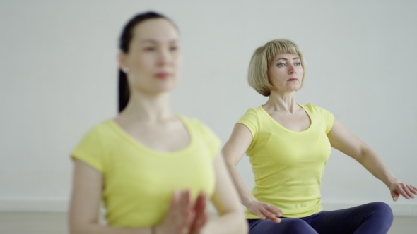 Young Women Are Practicing The Accomplished Pose 