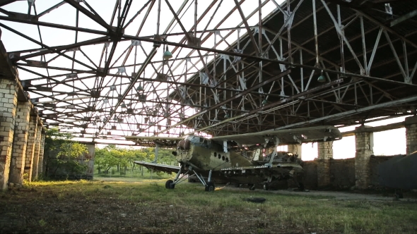 Old Military Airplane In The Hangar