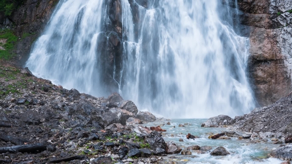 Waterfall In The Mountains