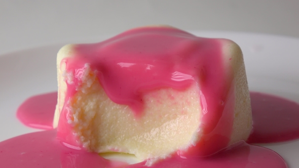 Taking a Piece Of Pudding And Pink Sauce With a Tea Spoon  Video