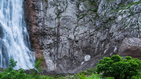 Waterfall In The Mountains