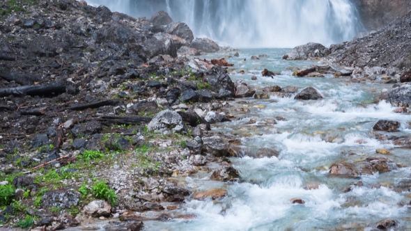 Waterfall In The Mountains