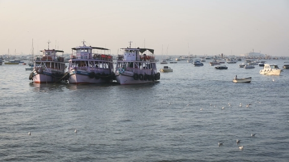 Tourist And Fisher Boats By The Harbour