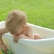 Cute Toddler Having a Bath In Garden - VideoHive Item for Sale