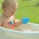 Cute Toddler Having a Bath in Garden - VideoHive Item for Sale