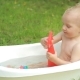 One Year Old Kid Having a Bath Outdoors - VideoHive Item for Sale