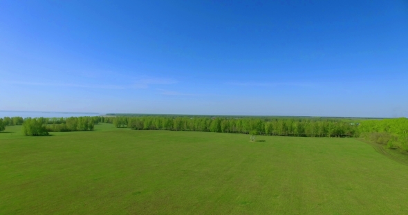  Aerial View. Low Flight Over Green And Yellow Wheat Rural Field.