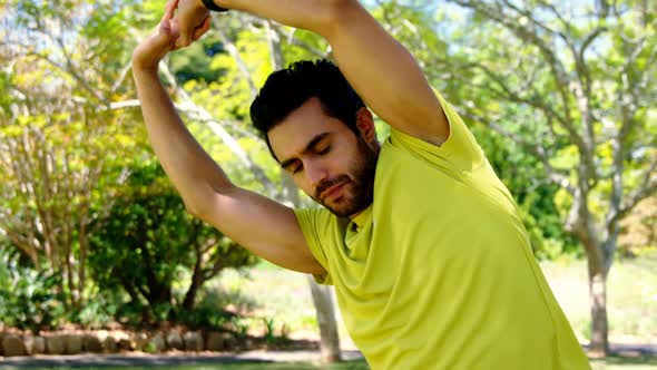 Man exercising in park