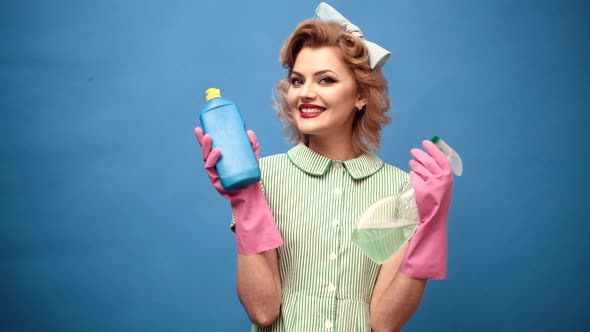 Pinup Woman with Cleaning Service Equipment Concept