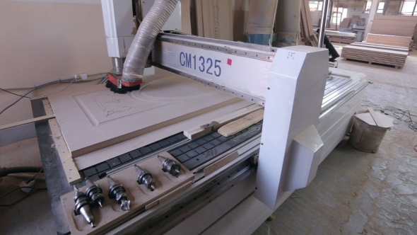 Automated CNC Wood Carving Machine Operates With Wood.