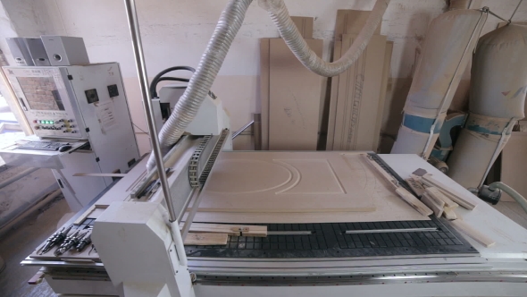 Automated CNC Wood Carving Machine Operates With Wood.