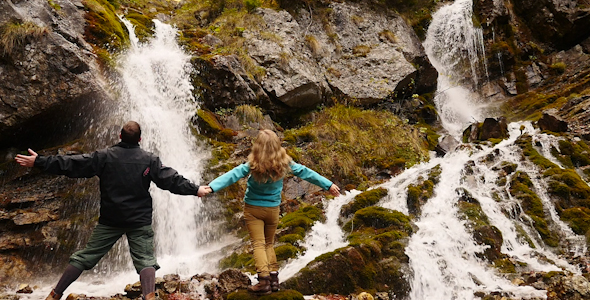 Lovers Enjoy Waterfall