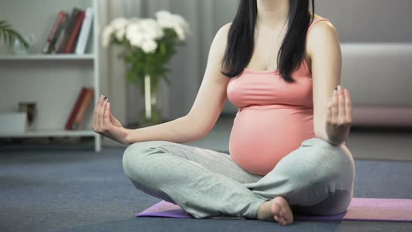 Quick With Child Lady Doing Yoga for Pregnant, Getting Body Toned, Meditation