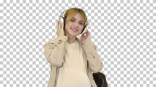 Young attractive pregnant woman listening, Alpha Channel