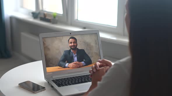 Young Woman Using Application for Distance Video Communication Online Via Laptop