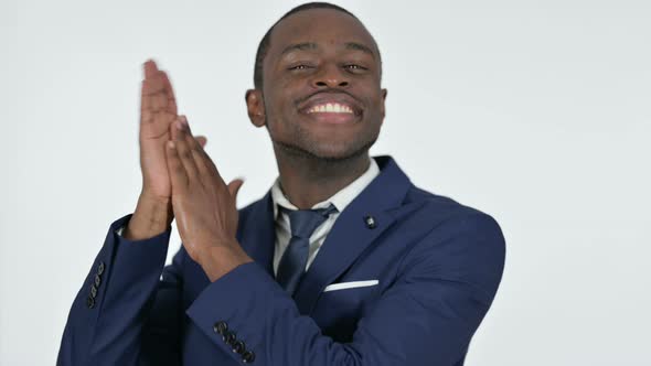 Clapping By African Businessman, White Background