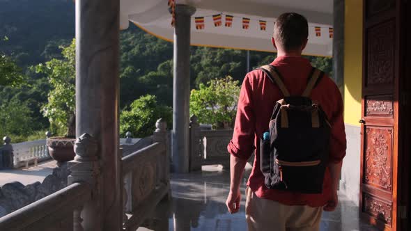 Man Tourist is Visiting Truc Lam Ho Quoc Zen Monastery in Vietnam