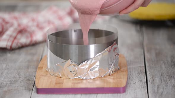 Pouring Berry Mousse Into Cooking Form. Step By Step French Mousse Cake Making Process.