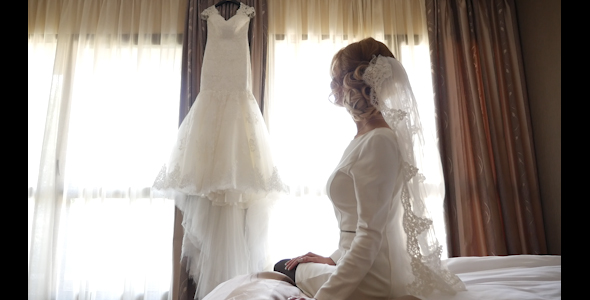 Bride Admiring Wedding Dress